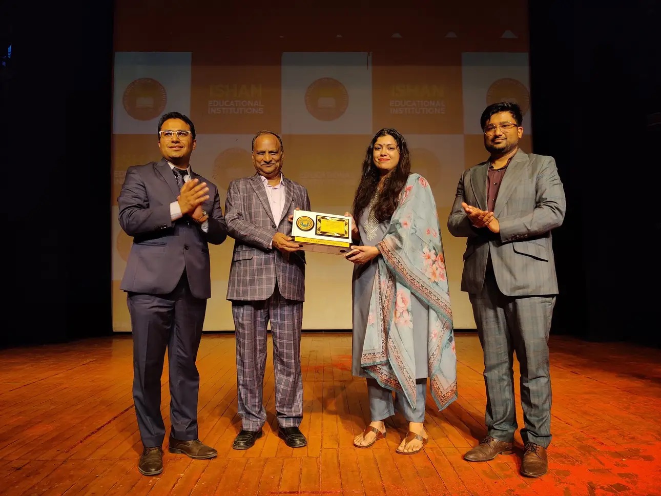 Researchers working with microscope